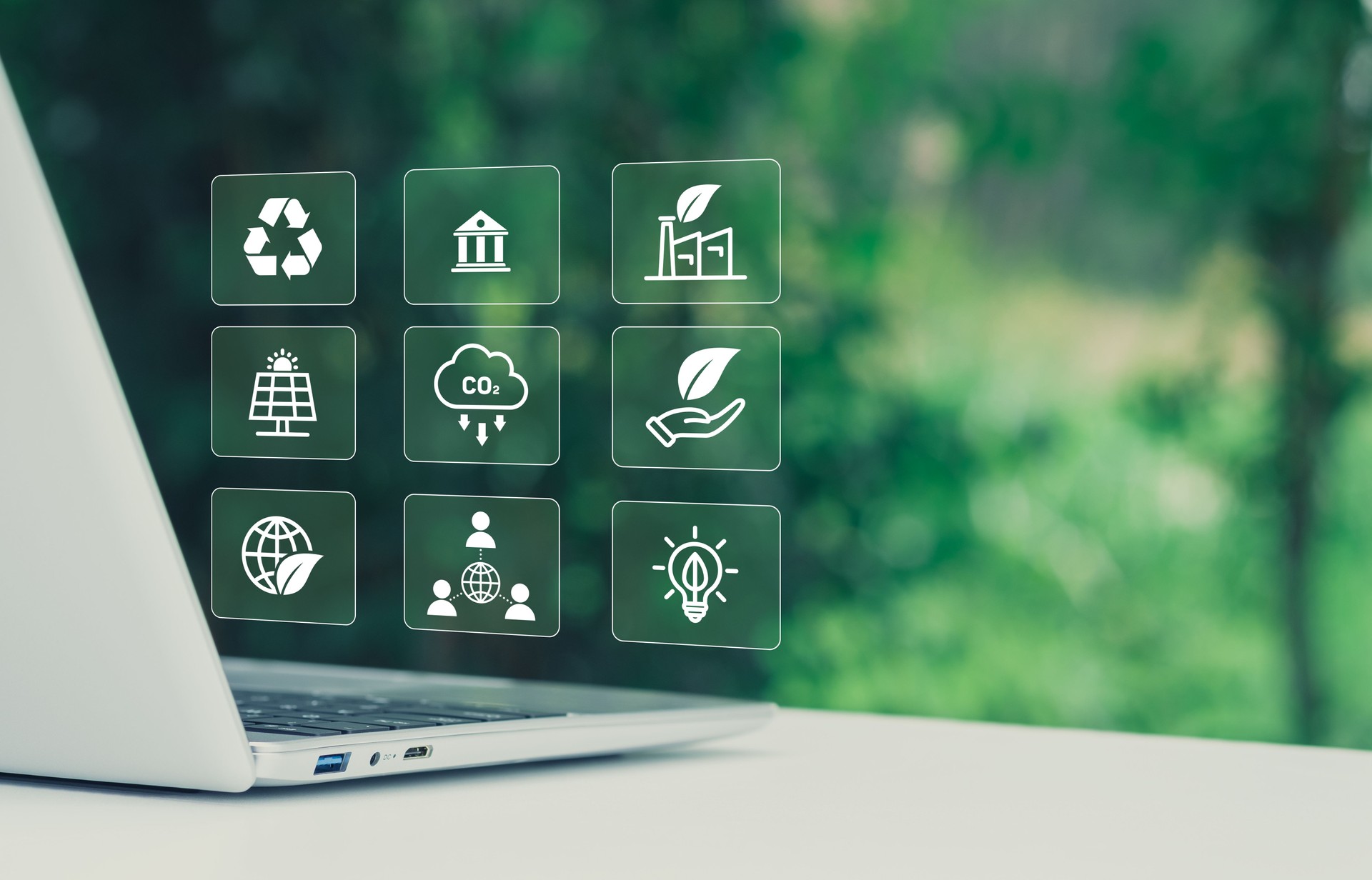 ESG concept, Digital interface on laptop with environmental, social, and governance icons, sustainability strategy, Natural green background, corporate responsibility, carbon footprint, green business
